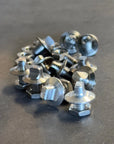 Collection of stainless steel mounting hardware included in the Tactic Engineering Ultimate Magnetic Accessories Bundle, assorted bolts nuts and fasteners for securing magnetic mounts and quick release pins, close up product photo on dark background