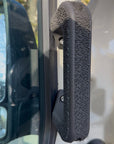 Mercedes Sprinter 907 ergonomic door handle 3D printed textured SLS nylon grip installed on van interior door close up