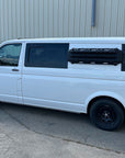 White VW Transporter Carrying Max Trax Recovery Boards with Tactic Engineering's original mounts