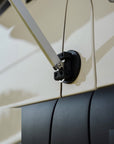 Close-up of Tactic Engineering magnetic Fiamma awning mount with quick-release pin holding the awning arm on the Weinsberg X-Pedition 4x4 Sprinter by Ferrigato Camper