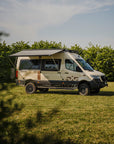 Weinsberg X-Pedition 4x4 Sprinter conversion by Ferrigato Camper with Thule awning extended on Tactic Engineering magnetic mounts