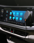 VW T7 Multivan MagSafe phone mount installed on the dashboard beside the infotainment screen, vehicle-specific no-drill fit by Tactic Engineering, Swiss made