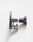 Tactic Engineering magnetic van hook side view showing the SLS 3D printed nylon hook body with quick release pin, neodymium magnet base and flex trash cutout design