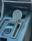 iPhone on magnetic phone mount in Cupra Formentor 2020–2023 showing map navigation, mounted at eye line beside the gear selector