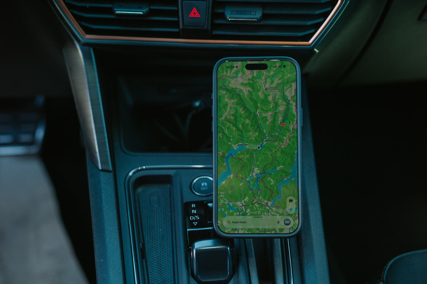 Magnetic Qi2 phone mount installed in Cupra Formentor 2020–2023 centre console slot, USB-C cable routed to the dash ports, made in Switzerland