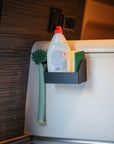 Tactic Engineering modular soap holder mounted in Hymer Grand Canyon S kitchen holding dish soap bottle, cleaning brush and sponges, black SLS 3D printed design with magnetic or bracket mounting options