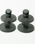 Close up of four Tactic Engineering magnetic supports for Starlink Mini showing embossed logo detail on the SLS 3D printed nylon brackets, rubber coated neodymium magnet bases visible from above on white background