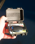 Tactic Engineering SecureMate 2.0 magnetic wallet held open showing van key, credit cards and cash inside waterproof case with industrial strength magnets for hiding under your vehicle
