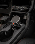 Tactic Qi2 MagSafe phone mount installed in a Ford Ranger 2024+ centre console cupholder, beside the gear selector