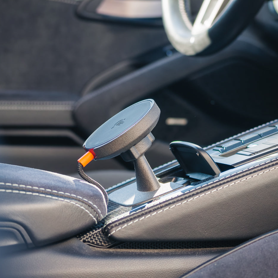 Tactic Engineering Smoker's Package phone mount for Porsche 911 991, MagSafe Qi2 wireless charging puck on the sintered nylon base in the ashtray recess