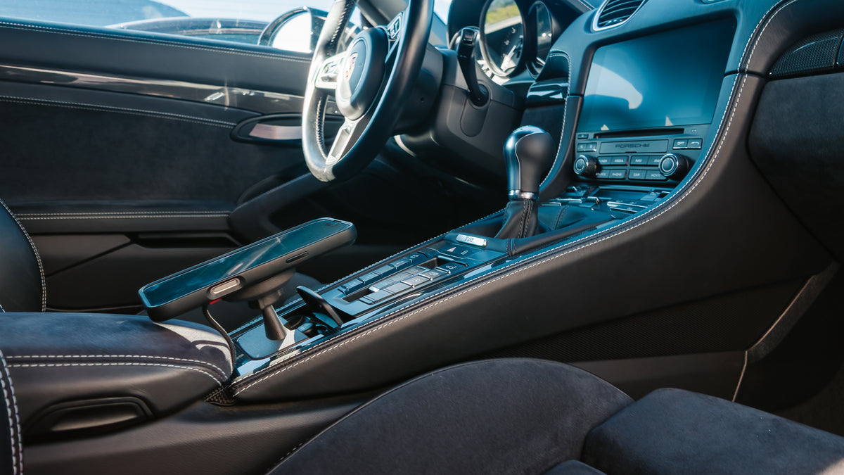 Porsche 911 991 interior with Alcantara and contrast stitching, Tactic Engineering Smoker's Package phone mount fitted in the centre console ashtray position