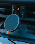Tactic Engineering phone mount for the Porsche Macan EV, front view of the MagSafe-compatible Qi2 charging head in the centre console