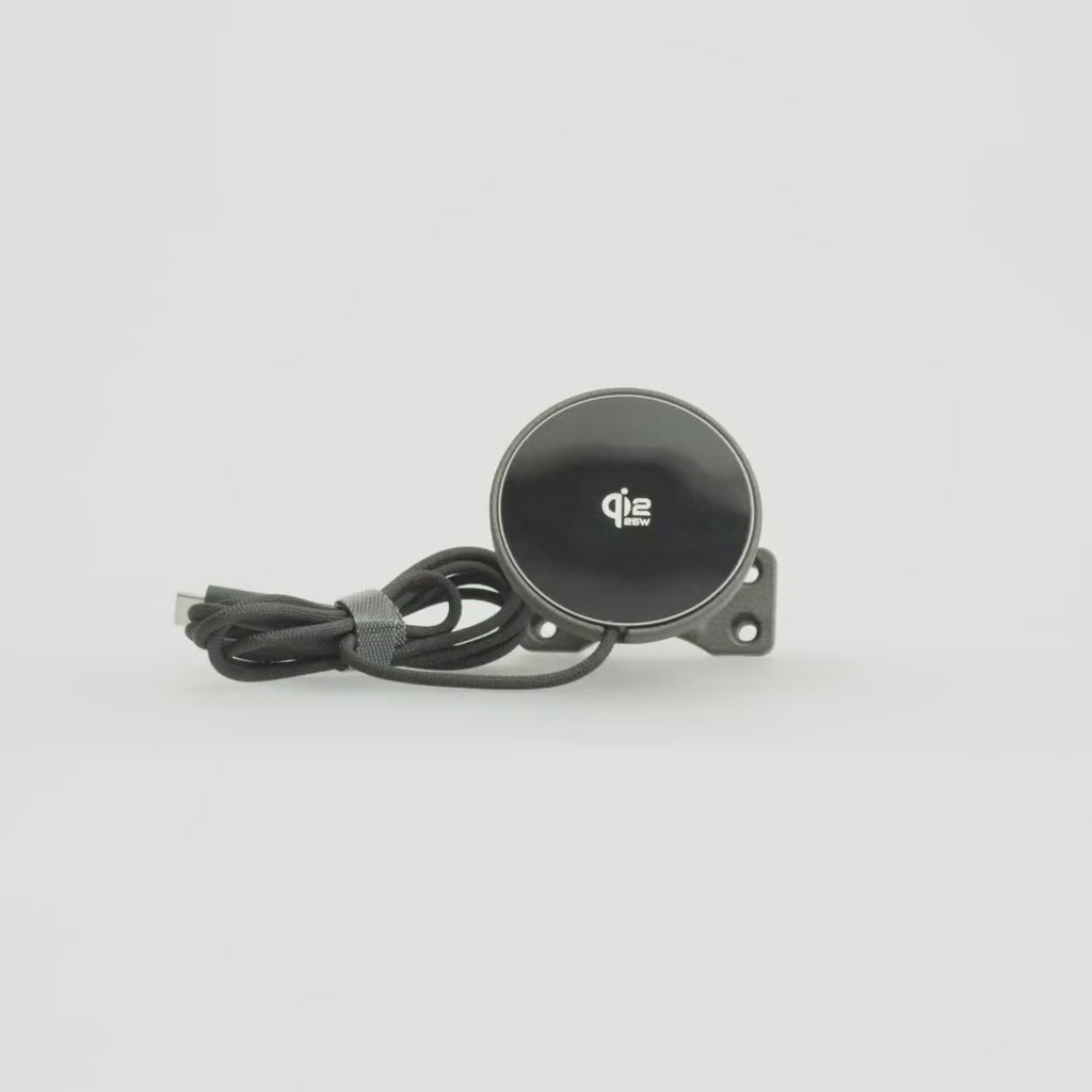 INEOS Grenadier phone mount by Tactic Engineering rotating 360°: vehicle-specific SLS nylon base designed and built in Switzerland, with MagSafe-compatible Qi2 wireless charger. Fits Grenadier Station Wagon and Quartermaster.