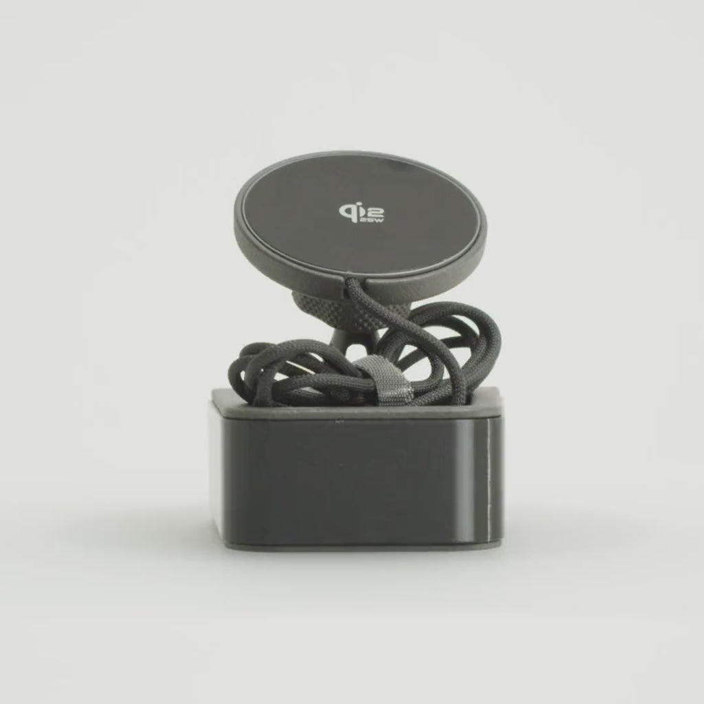 Porsche Macan 95B (2014–2021) phone mount by Tactic Engineering rotating 360°: vehicle-specific SLS nylon base designed and built in Switzerland, with MagSafe-compatible Qi2 wireless charger.