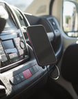 iPhone on the Tactic MagSafe phone mount in the centre cup holder of a pre-2022 Fiat Ducato, same dashboard as Ram ProMaster